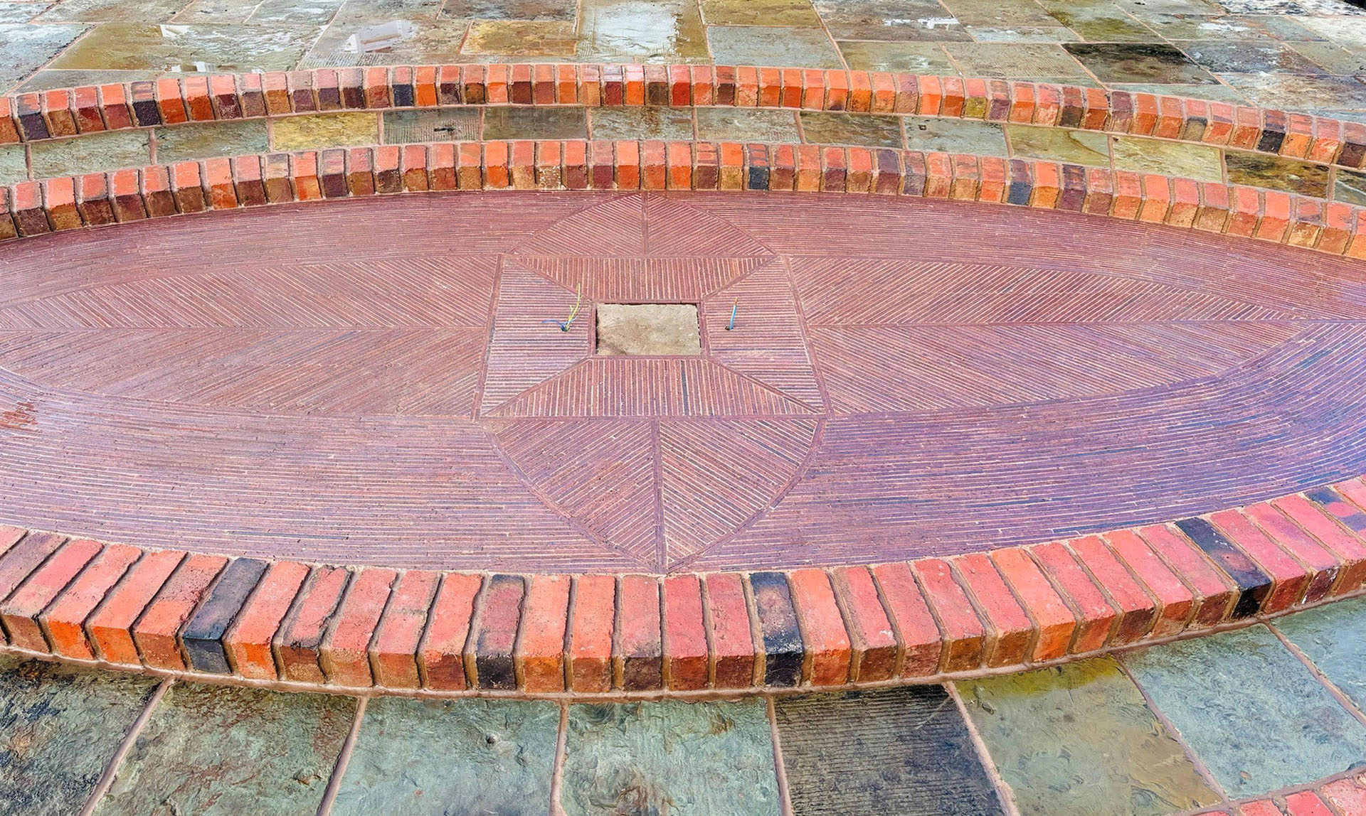 creasing tile design laid in a York Stone patio by Avery Landscape
